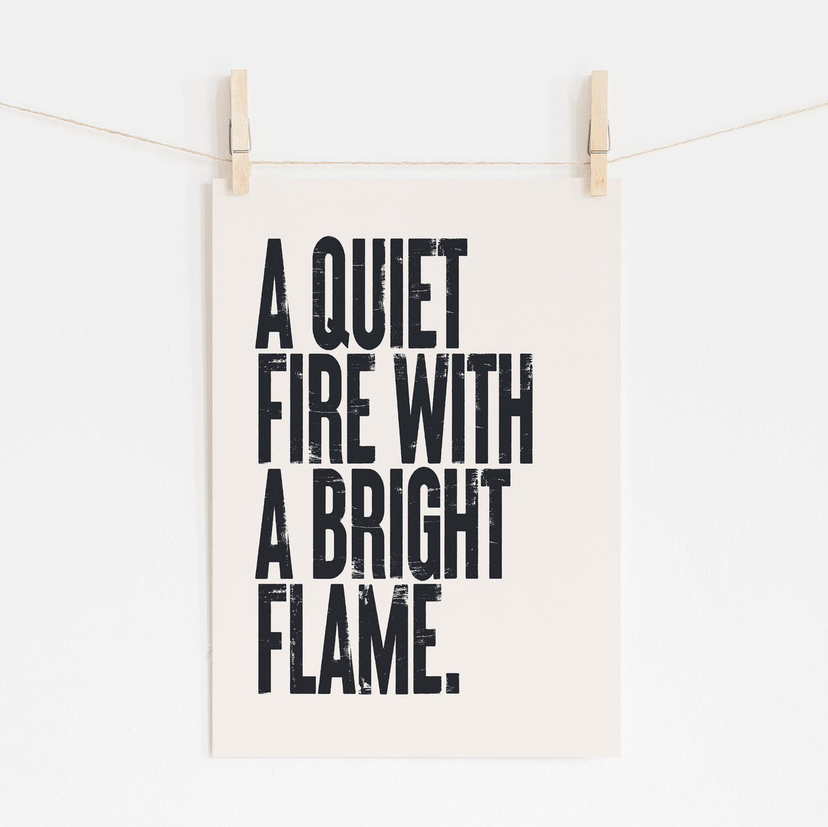 A QUIET FIRE WITH A BRIGHT FLAME