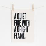 A QUIET FIRE WITH A BRIGHT FLAME